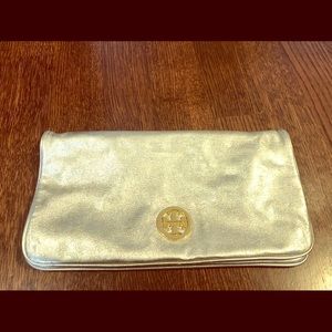 Tory Burch gold clutch